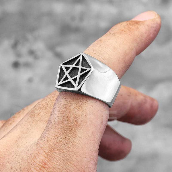 man wearing a satan ring with stars to match with techwear dark outfit