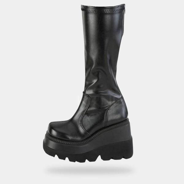 Black platform boots with a back zip