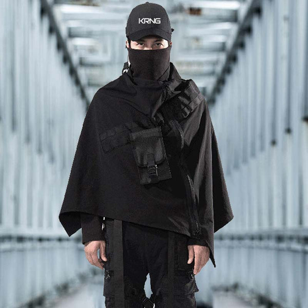 man wearing a black cyberpunk cloack with a hat