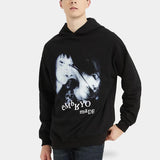 man wearing a monster hoodie with two yurei ghost girls
