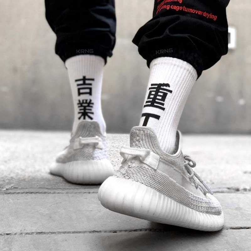 Man wearing white ninja socks with techwear sneakers