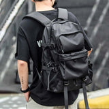 man with tactical bag black and a techwear shirt