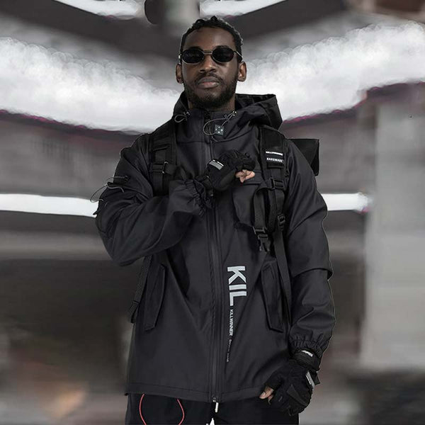 Black man wearing a techwear jacket Uk